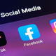 The TikTok, Facebook, and Instagram apps on a phone screen